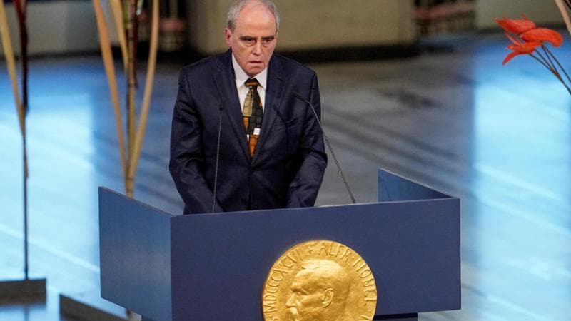 Jan Rachinskij a Oslo nel 2022 mentre ritira il Nobel per la pace a nome dell&rsquo;organizzazione Memorial
