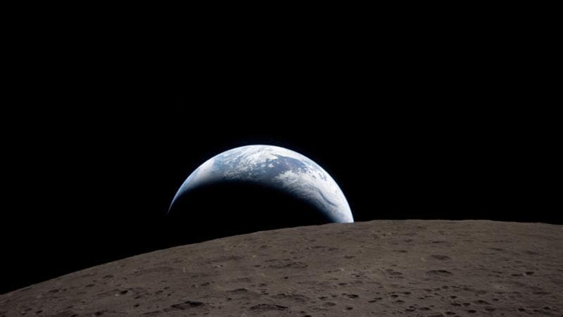 Il tramonto della Terra dietro al lato nascosto della Luna