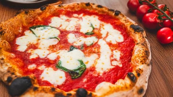 La pizza simbolo della tradizione gastronomica nazionale: amata dall’82% degli italiani