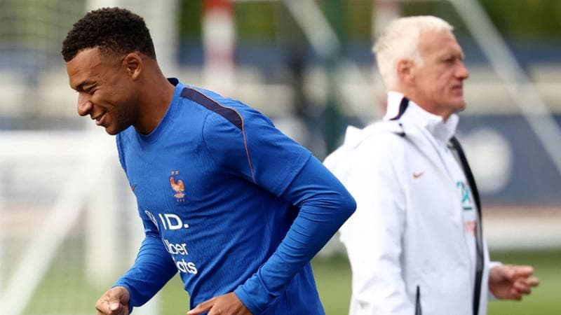 Kylian Mbappé e Didier Deschamps