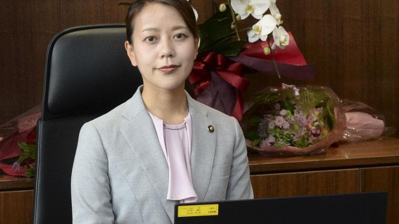 Shoko Kawata, who became Japan's youngest-ever female mayor at 33 years old after winning election in Yawata, Kyoto Prefecture, western Japan, takes a seat behind her desk at the city office on Nov. 16, 2023, her first day in office. (Kyodo)
==Kyodo
NO USE JAPAN