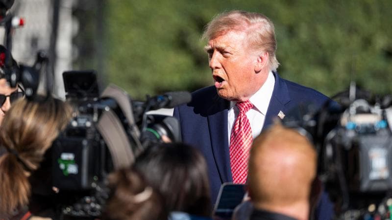 epa13316087 US President Donald Trump speaks to reporters as he departs the White House for a campaign event in Kansas, in Washington, DC, USA, 19 October 2026.  EPA/JIM LO SCALZO