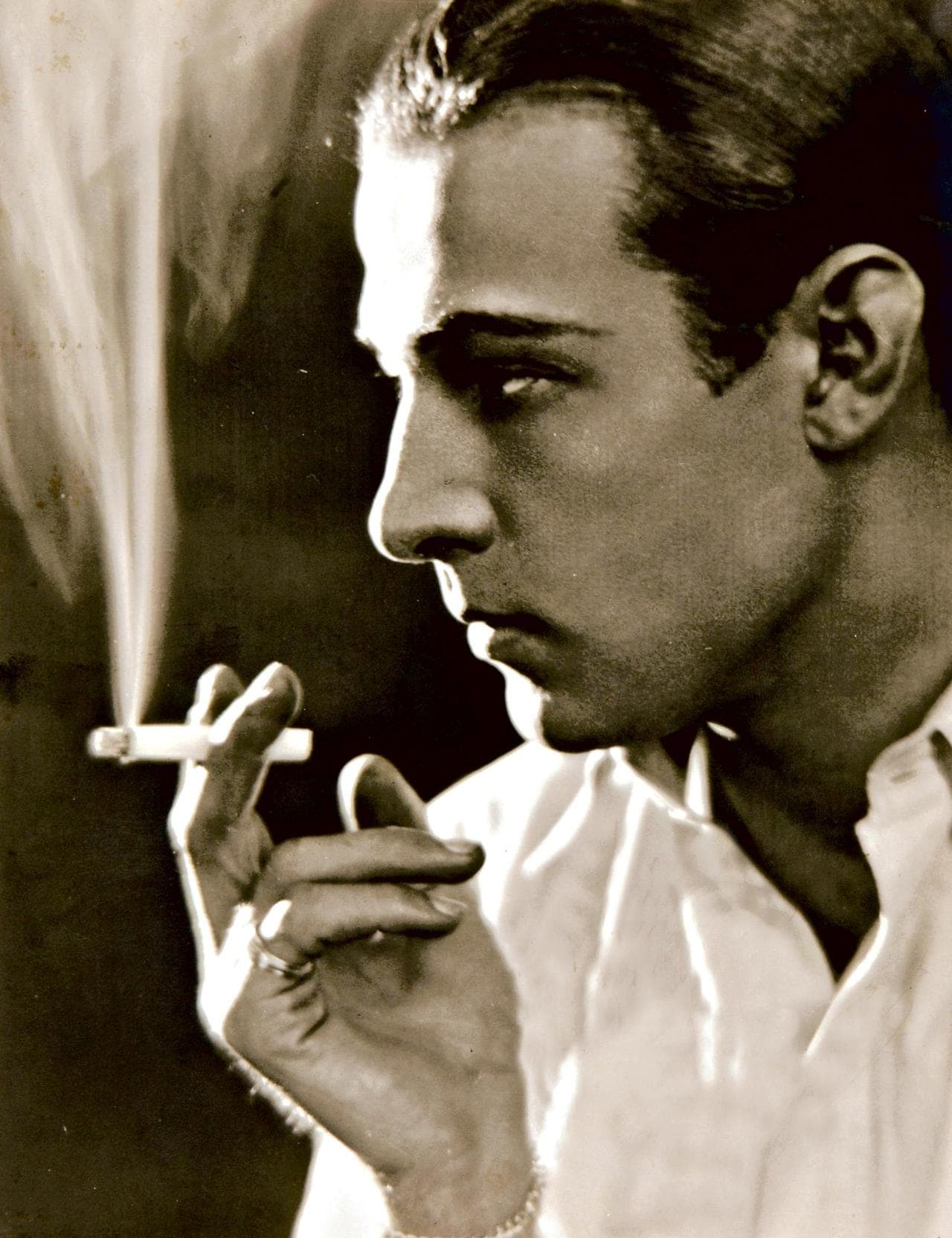 DGC1248955 Portrait of Rudolph Valentino (1895 – 1926) (b/w photo).; Private Collection; (add.info.: Rodolfo Alfonso Raffaello Pierre Filibert Guglielmi di Valentina d\'Antonguolla, professionally known as Rudolph Valentino (1895 – 1926), was an Italian-born actor who starred in several well-known silent films. An early pop icon, a sex symbol of the 1920s, he was known as the "Latin Lover" or simply as "Valentino". He had applied for American citizenship shortly before his death, which occurred at age 31, causing mass hysteria among his female fans and further propelling him into iconic status;); Prismatic Pictures .