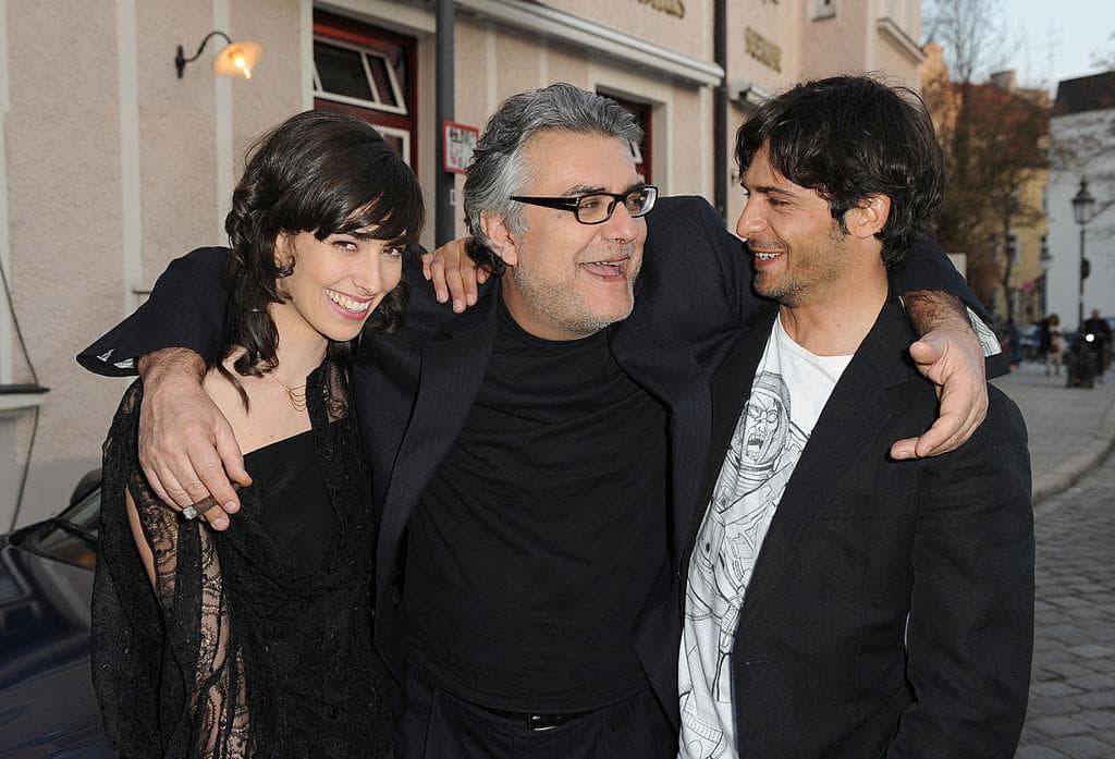 Writer Giancarlo De Cataldo with actors Daniela Virgilio and Marco Bocci, who played two of the most popular characters in the television series. Photo: Hannes Magerstaedt/Getty Images