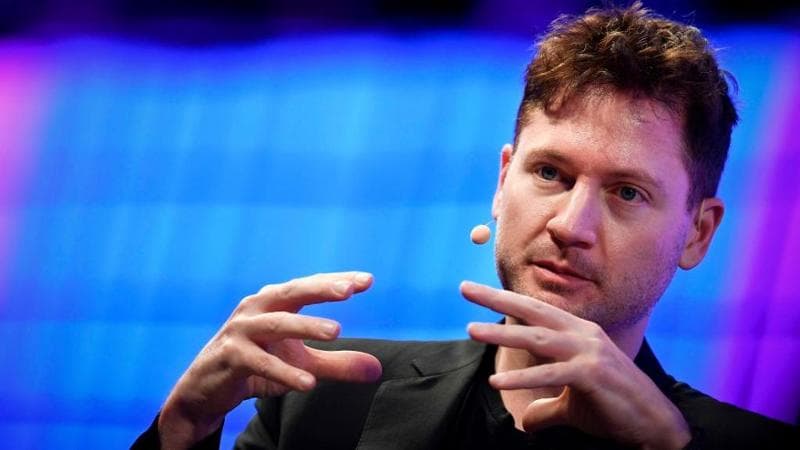 Bryan Johnson gestures during a interview at the main stage of the Web Summit in Lisbon on November 7, 2017