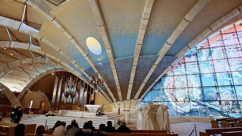 The faithful pray at the Church of San Pio, designed by Renzo Piano, in San Giovanni Rotondo, Puglia