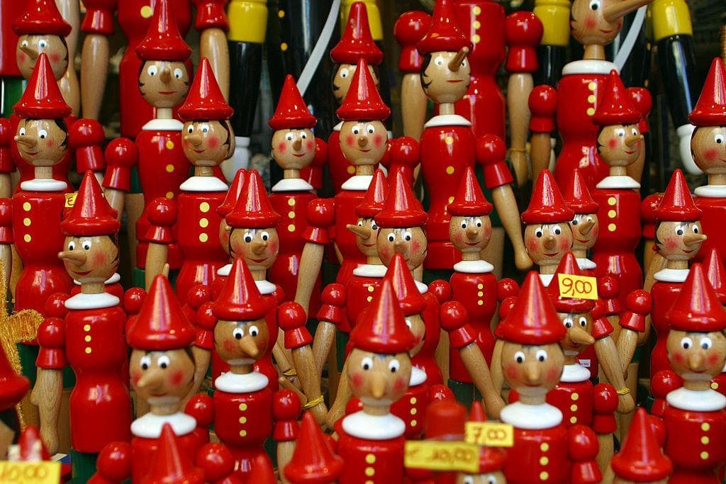 Hand-carved and hand-painted wooden Pinocchio figures on display in a shop window in Florence, Italy. (Photo: Andrew Aitchison/In Pictures Ltd./Corbis via Getty Images)