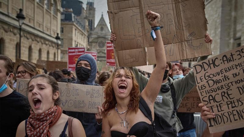 Students take to the streets in Paris on 6 October (Kiran Ridley / AFP)