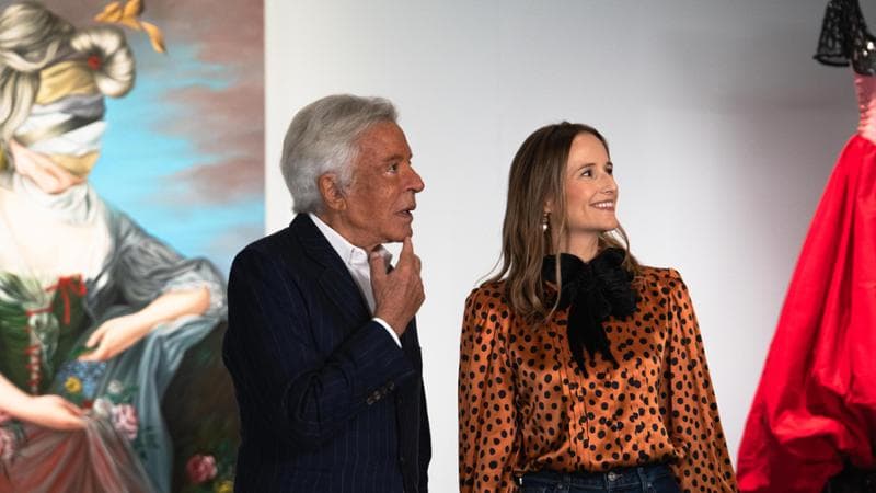 Ewa Juszkiewicz (R) and Giancarlo Giammetti at the exhibition “Aura” at PM23 in Rome