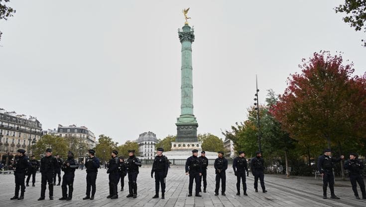 Paris, 24 October: law-enforcement agencies patrol the Place de la Bastille