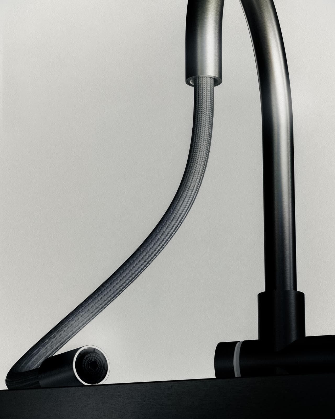 Two streams of water flow through the pull-out shower head but never meet