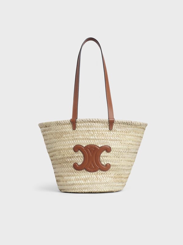 Borsa in paglia intrecciata manici in pelle